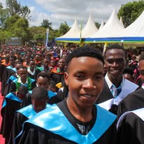 A smiling graduate